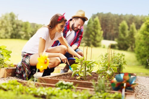 Garden team separating green waste for recycling