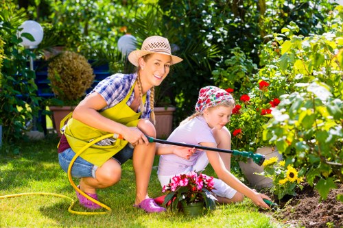 Professional Bellingham gardeners pruning shrubs and improving landscape health